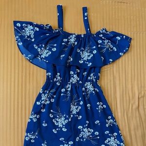 Floral romper with cold shoulder. Great condition.